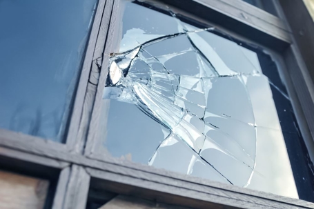 Broken window of home